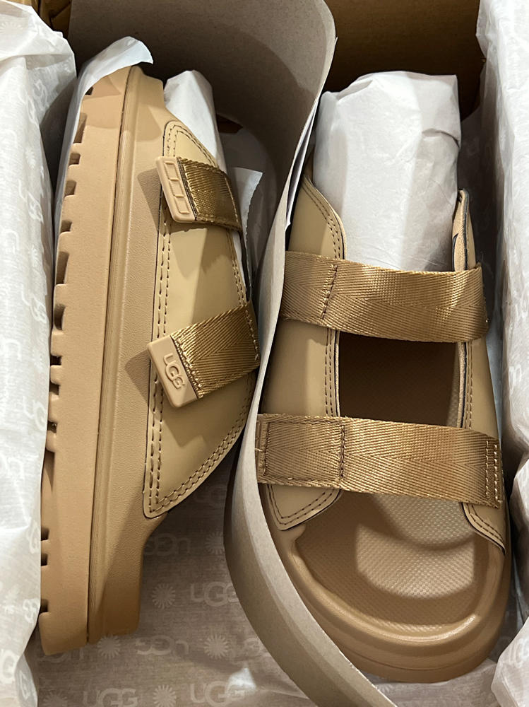 UGG Kids K Goldenglow Slide Sandal, Dark Sand, 6 fits women's 8